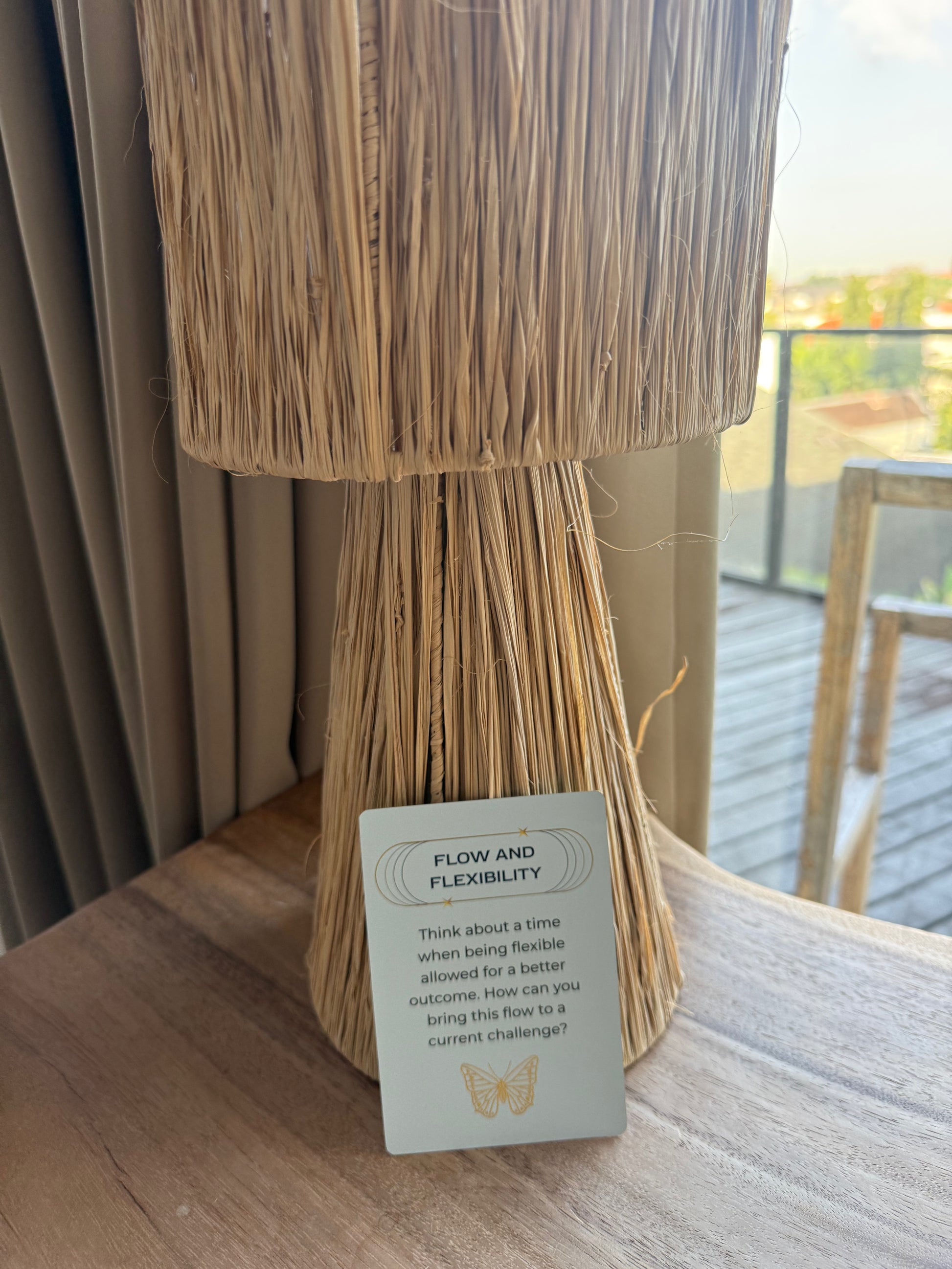 Flow & Flexibility card from Intuitive Leadership Practice Deck leaning on lamp.
